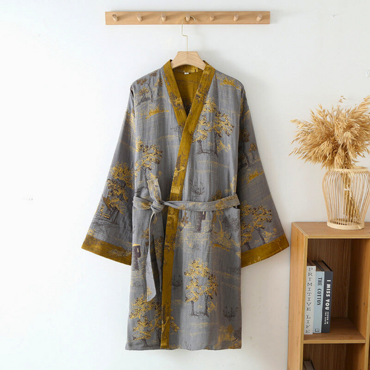 Peignoir en coton de luxe pour hommes et femmes, parfait pour des moments de détente intérieure.
