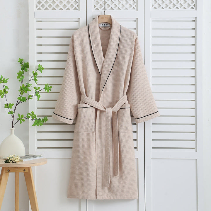 Peignoir de maison unisexe en coton nid d'abeille, élégant et douillet, parfait pour hommes et femmes.