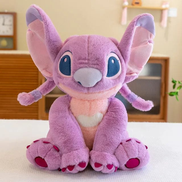 Peluche Stitch adorable, douce et câline.  Disponible en 3 tailles : 30cm, 45cm, 60cm.  Parfait pour les enfants.
