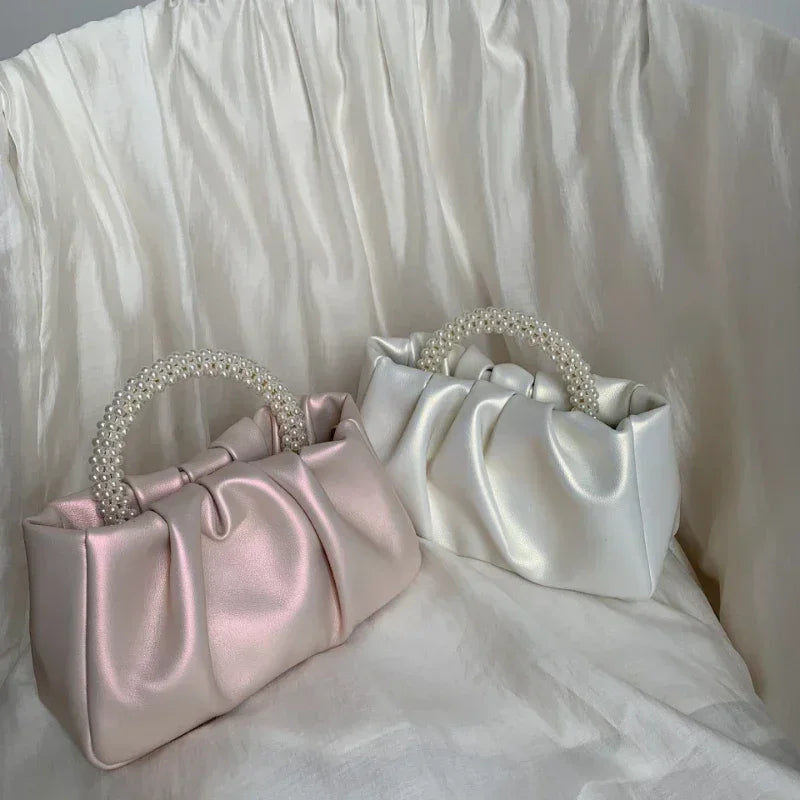 Petit sac de soirée élégant pour femme avec perles, idéal pour mariage ou cérémonie.