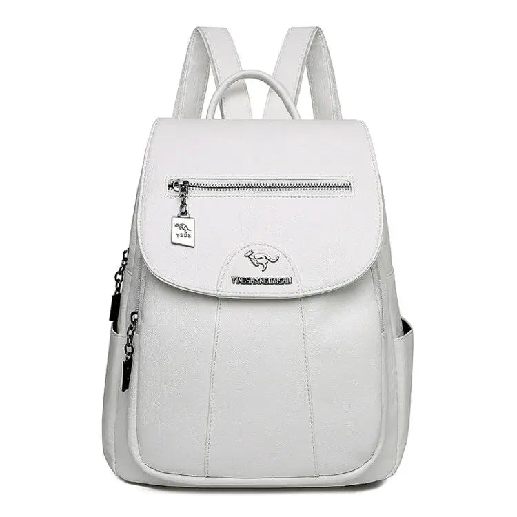 Petit sac à dos élégant en polyuréthane pour femme, accessoire de mode compact.