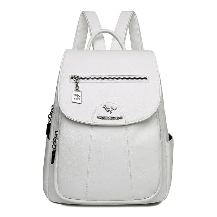 Petit sac à dos élégant en polyuréthane pour femme, accessoire de mode compact.