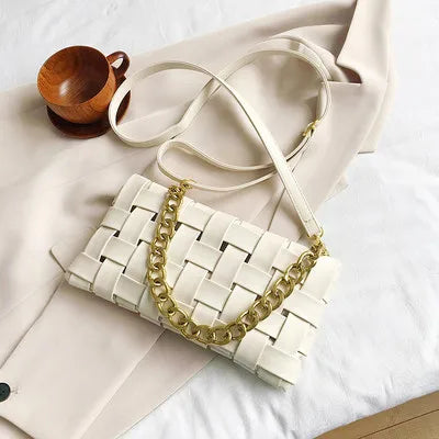 Petit sac élégant Anita, format pochette chic en cuir PU, idéal pour transporter l'essentiel avec style.