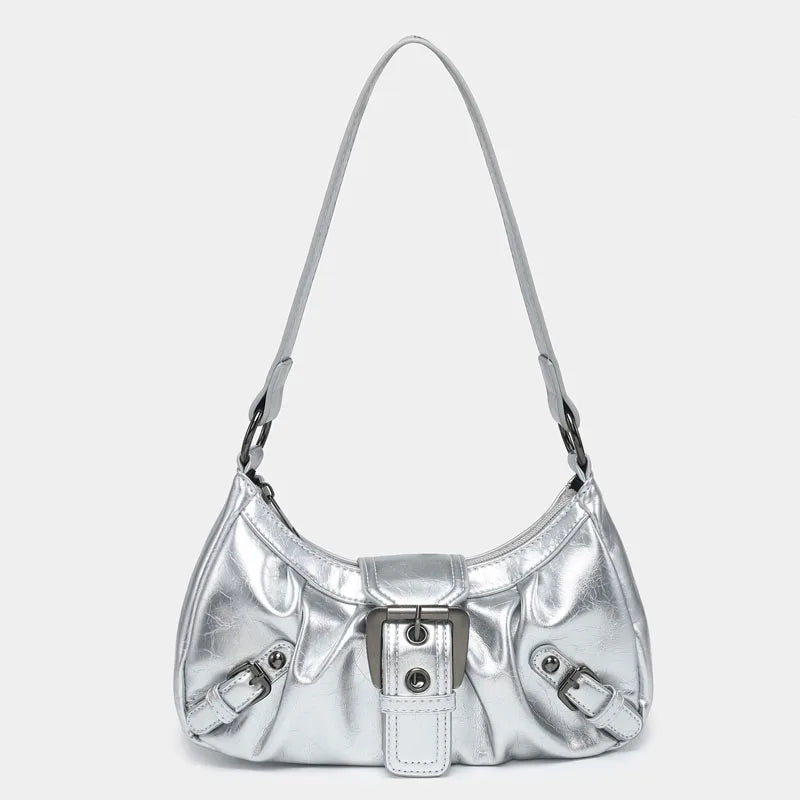 Sac à main femme argenté tendance, petit et chic, avec bandoulière pour l'épaule. Style vintage élégant et compact.