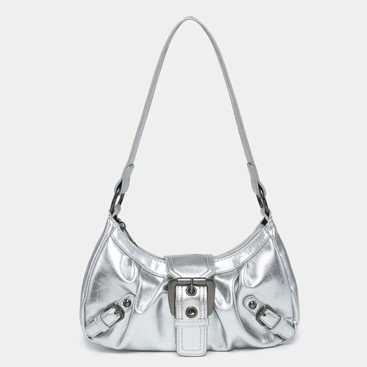 Sac à main femme argenté tendance, petit et chic, avec bandoulière pour l'épaule. Style vintage élégant et compact.