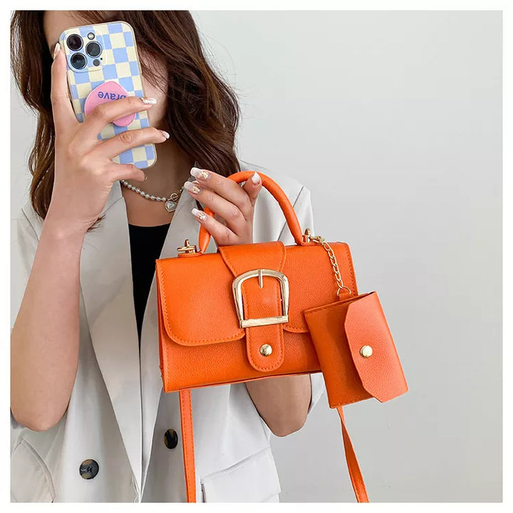 Sac à main chic en similicuir moderne pour femme, avec fermeture éclair.