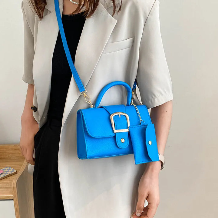 Sac à main élégant en similicuir noir, parfait accessoire de mode pour femme.