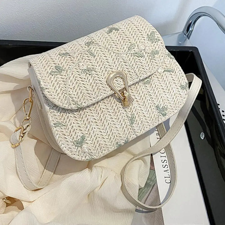 Sac à main bohème en paille pour femme, peut être porté en bandoulière, accessoire parfait pour un style naturel.