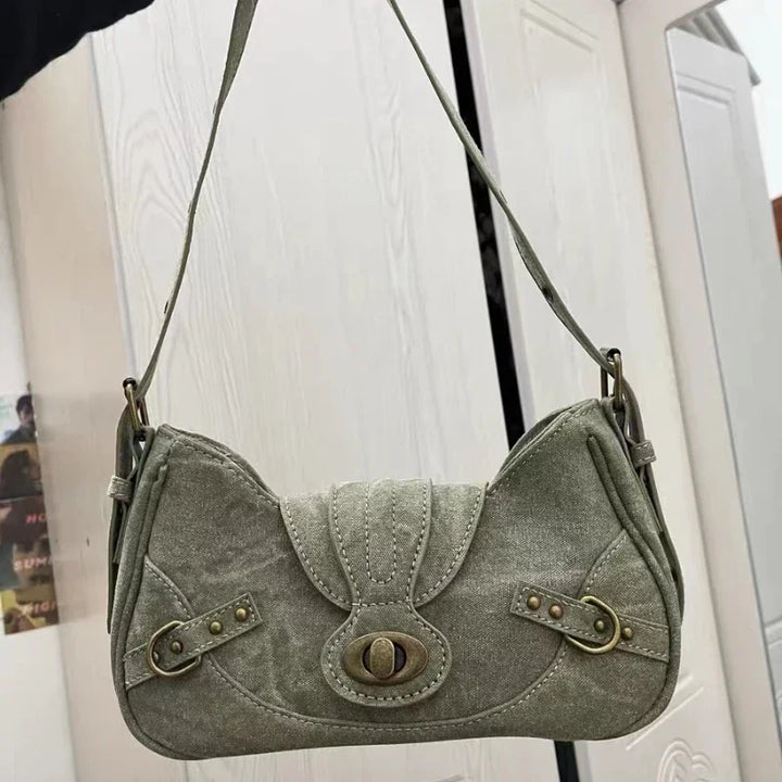 Sac bandoulière vert en toile pour femme, accessoire de mode élégant et pratique, idéal pour usage quotidien.