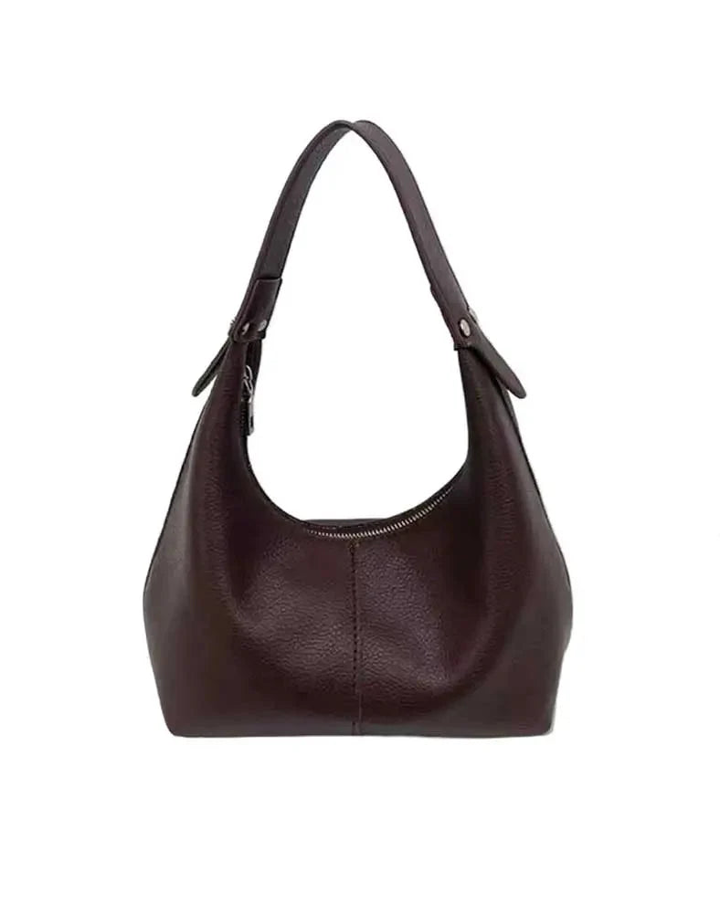 Accessoire mode femme : petit sac porté épaule chic en similicuir, sac de soirée polyvalent.