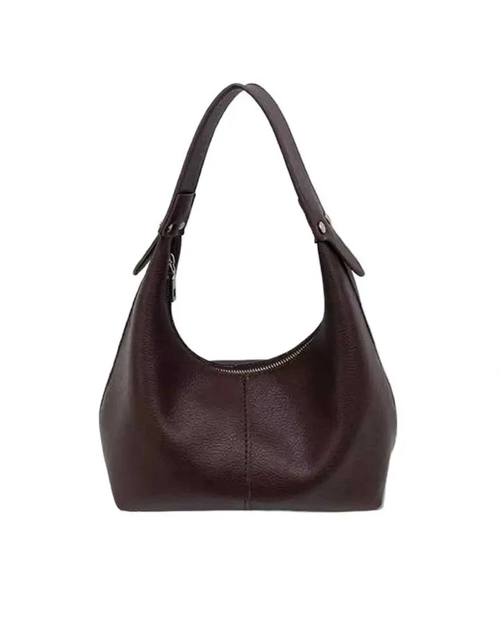Accessoire mode femme : petit sac porté épaule chic en similicuir, sac de soirée polyvalent.