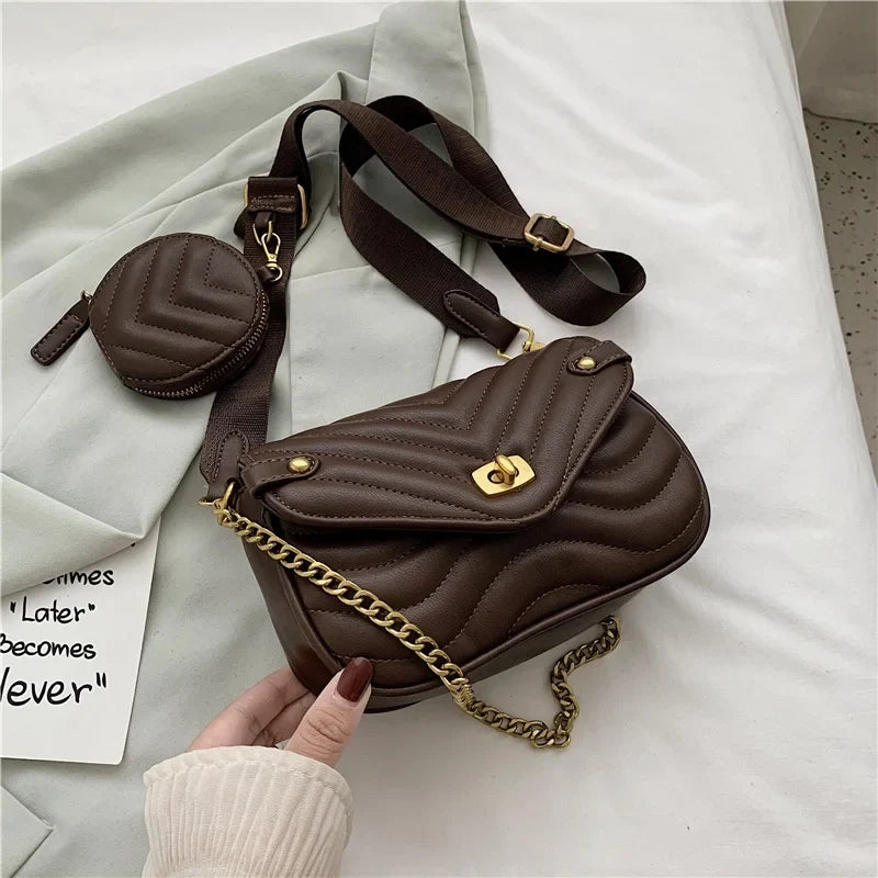 Sac à main femme noir élégant avec bandoulière chaîne, en cuir PU de qualité, motif matelassé tendance.