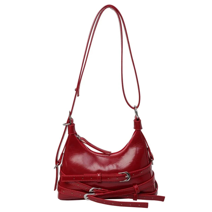 Sac à main petit format femme noir, design rock chic, bandoulière ajustable, accessoire mode tendance.