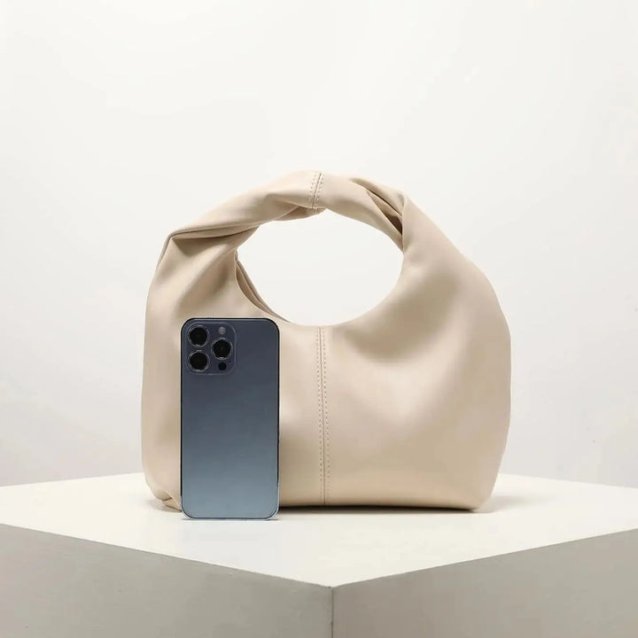 Sac femme chic à bandoulière, petit format, en cuir synthétique, parfait accessoire mode polyvalent.