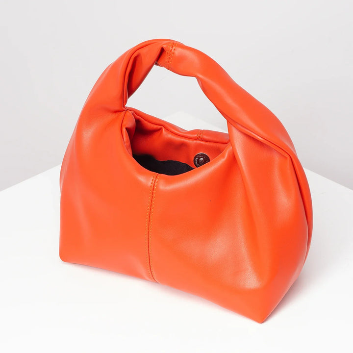 Petit sac à main femme, design élégant et chic, en cuir synthétique, accessoire mode indispensable.