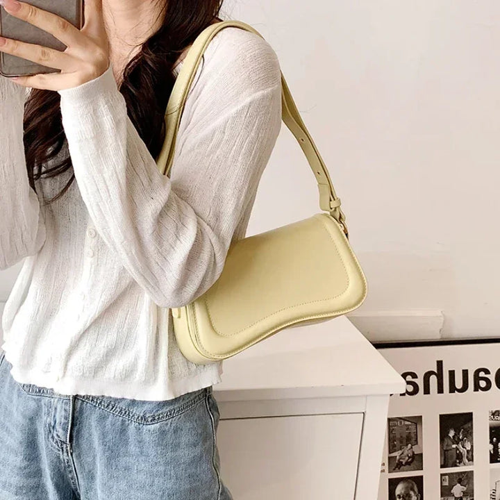 Petit sac à main élégant pour femmes en similicuir, idéal pour toutes occasions.