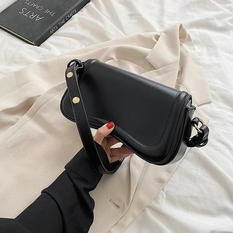 Petit sac à main mode pour femmes, accessoire tendance en similicuir, chic et pratique.
