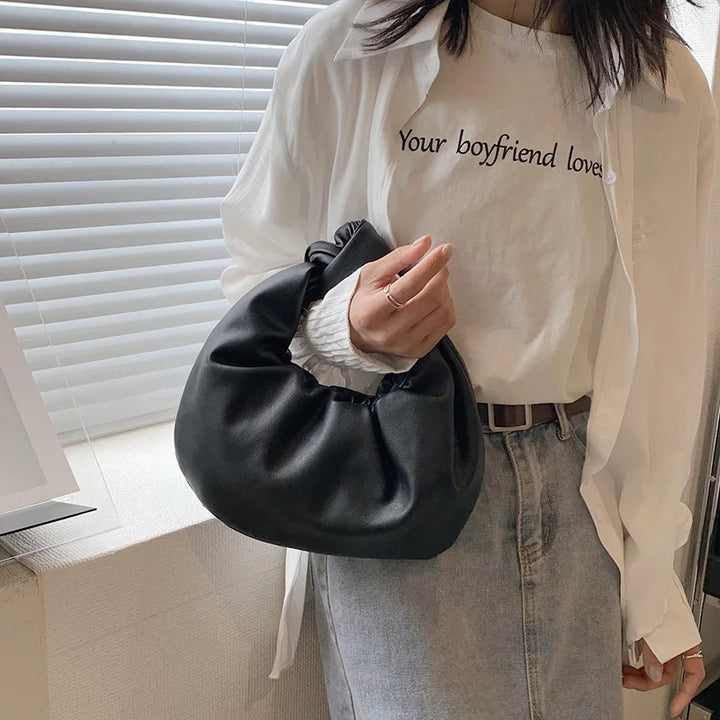 Sac à main rond tendance pour femme en cuir synthétique, accessoire mode compact et chic, idéal pour l'été.