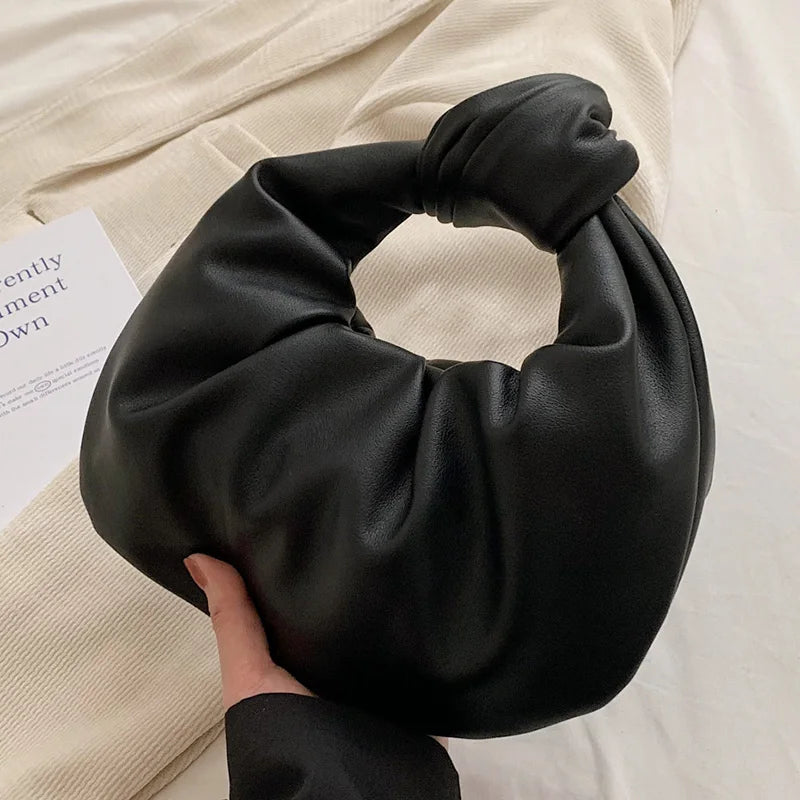 Sac à main femme rond en cuir synthétique, mode compacte et élégante, accessoire parfait pour l'été ou soirée.