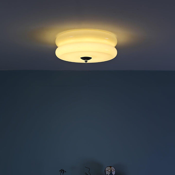 "Plafonnier Art Déco Vintage élégant avec design géométrique, en fer et verre, pour un éclairage chic et luxueux."
