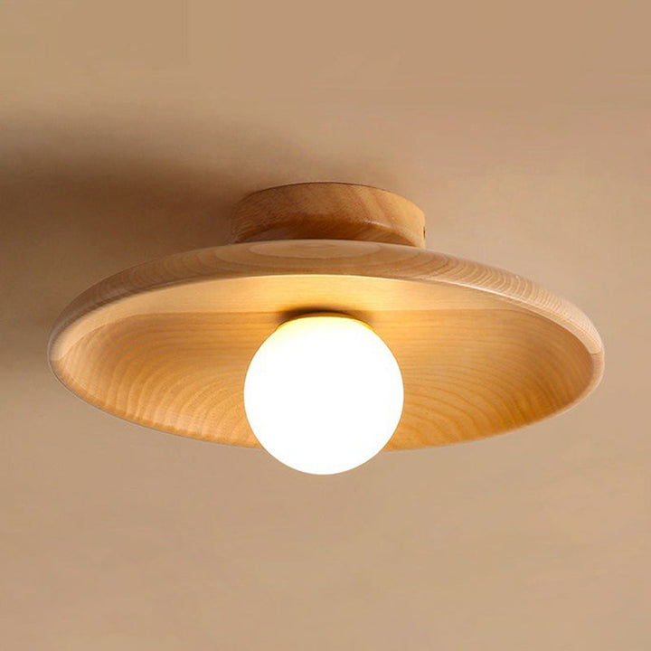"Plafonnier en bois minimaliste, forme incurvée douce, lumière LED, design moderne pour salon ou bureau."