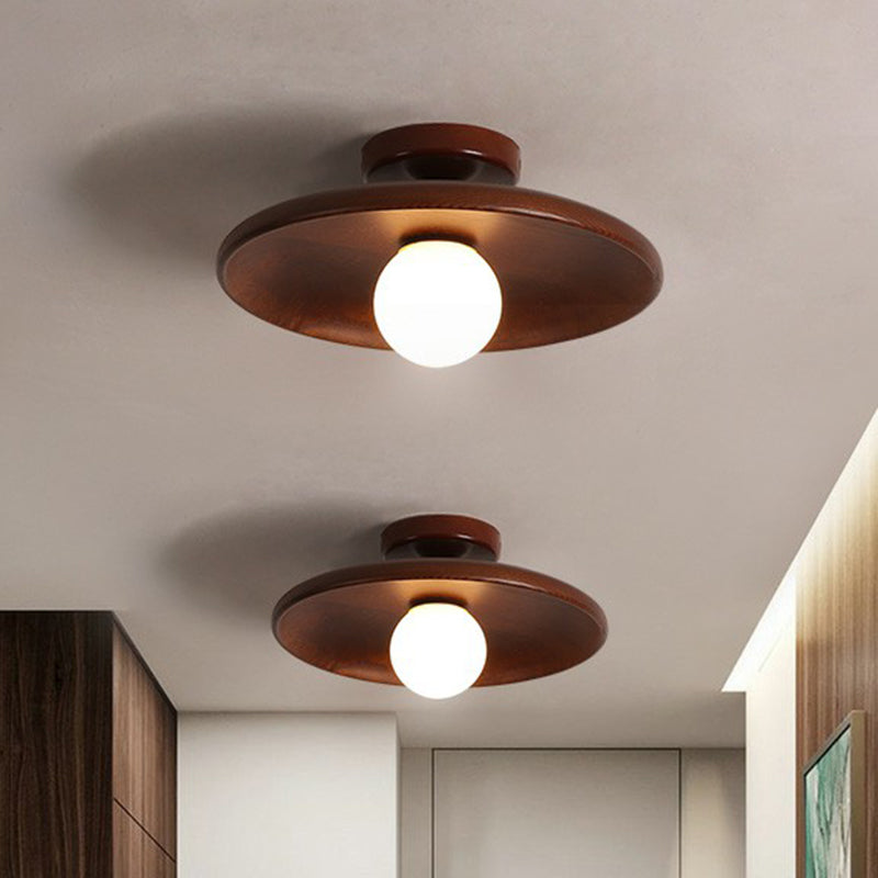 "Plafonnier en bois minimaliste, forme incurvée douce, lumière LED, design moderne pour salon ou bureau."
