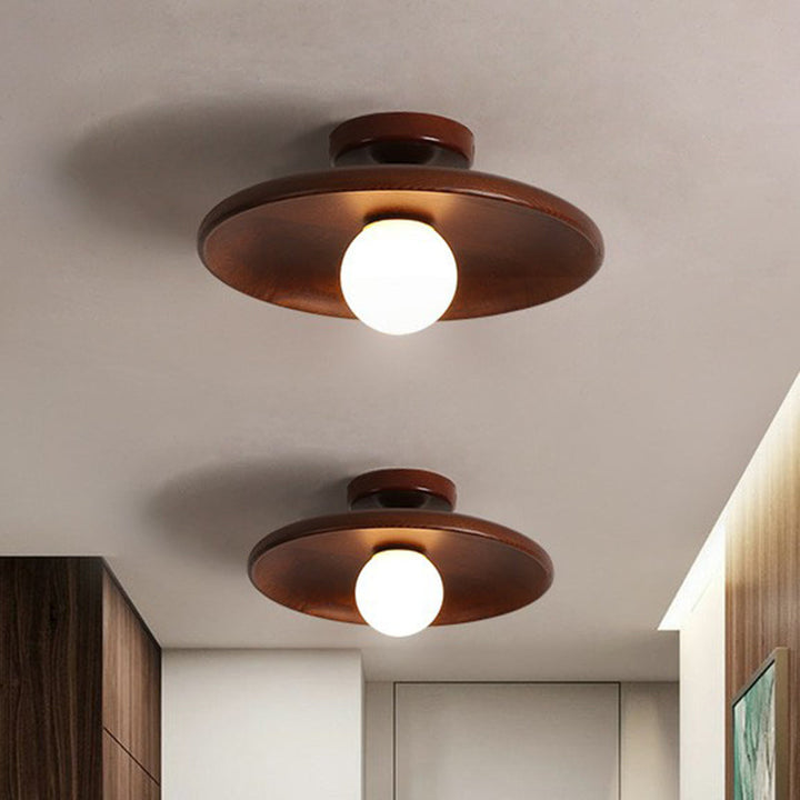 "Plafonnier en bois minimaliste, forme incurvée douce, lumière LED, design moderne pour salon ou bureau."