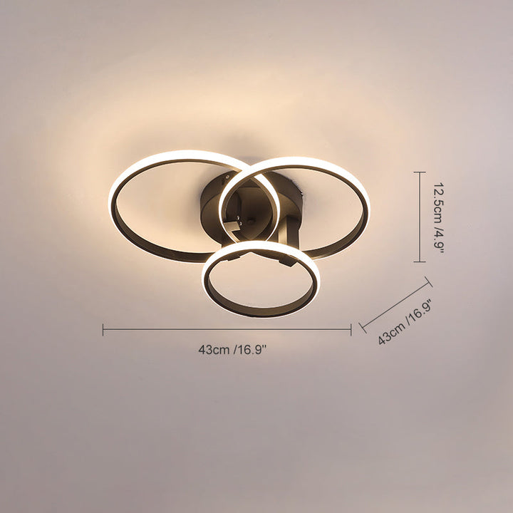 Plafonnier LED moderne, design circulaire, intensité variable.  Éclairage blanc.
