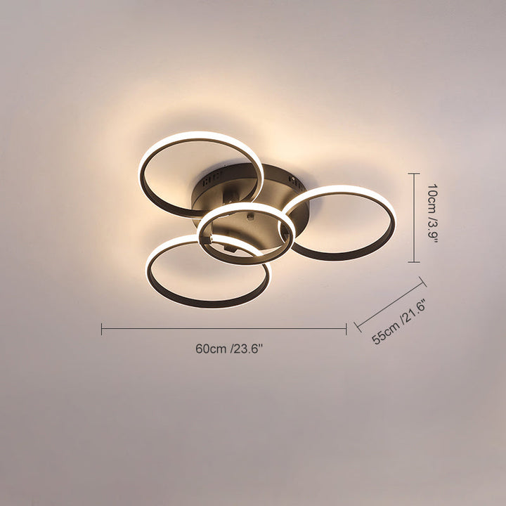 Plafonnier LED moderne, design circulaire, intensité variable.  Éclairage blanc.