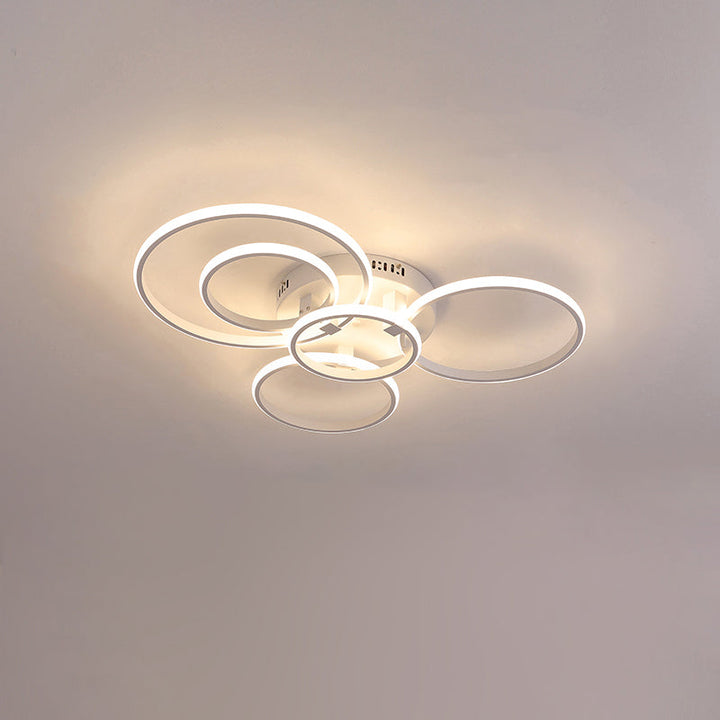 Plafonnier LED moderne, design circulaire, intensité variable.  Éclairage blanc.