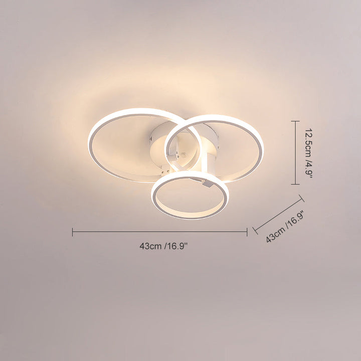 Plafonnier LED moderne, design circulaire, intensité variable.  Éclairage blanc.
