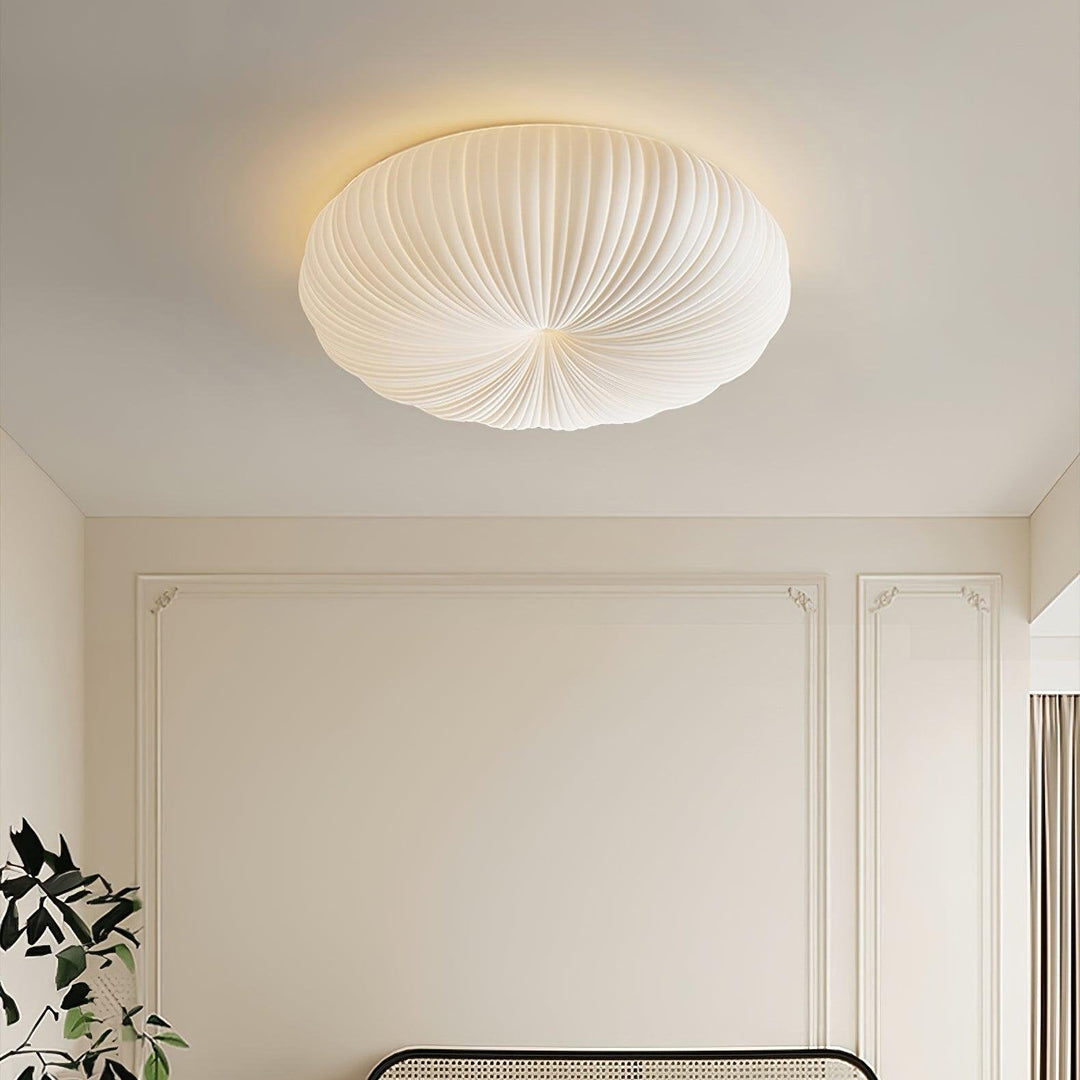 Plafonnier LED moderne et élégant.  Design raffiné, lumière chaleureuse, variateur d'intensité.