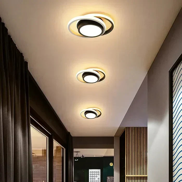 "Plafonnier LED moderne rond blanc, design épuré, éclairage écoénergétique idéal pour décoration contemporaine."