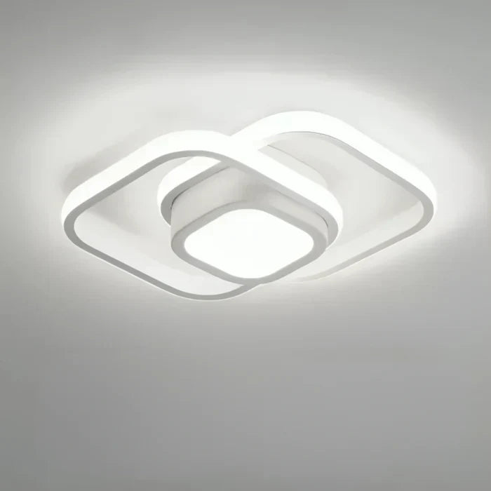 "Plafonnier LED moderne rond blanc, design épuré, éclairage écoénergétique idéal pour décoration contemporaine."
