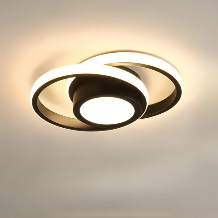 "Plafonnier LED moderne rond blanc, design épuré, éclairage écoénergétique idéal pour décoration contemporaine."