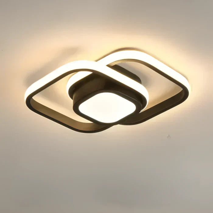 "Plafonnier LED moderne rond blanc, design épuré, éclairage écoénergétique idéal pour décoration contemporaine."