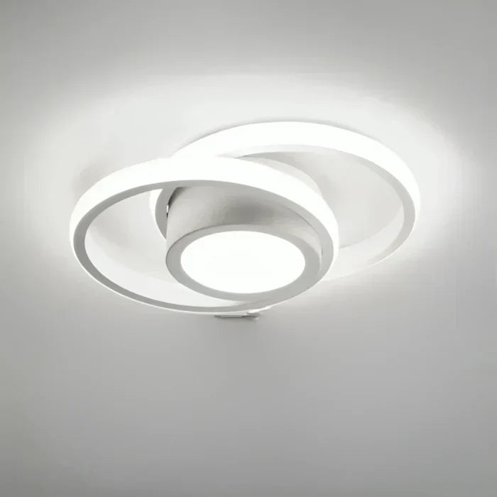 "Plafonnier LED moderne rond blanc, design épuré, éclairage écoénergétique idéal pour décoration contemporaine."