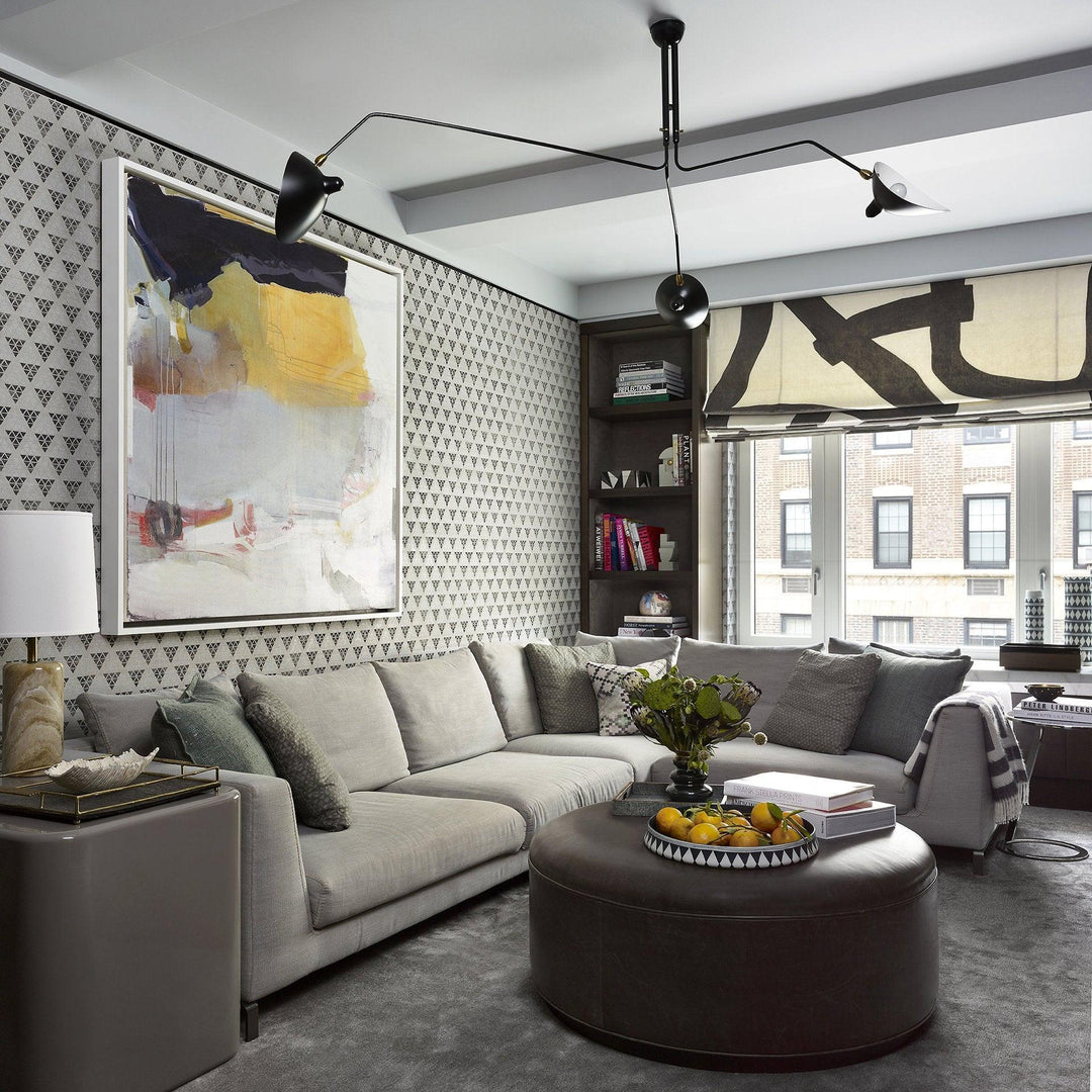 Plafonnier moderne à bras ajustable en métal noir, design élégant et épuré, pour éclairage directionnel contemporain.