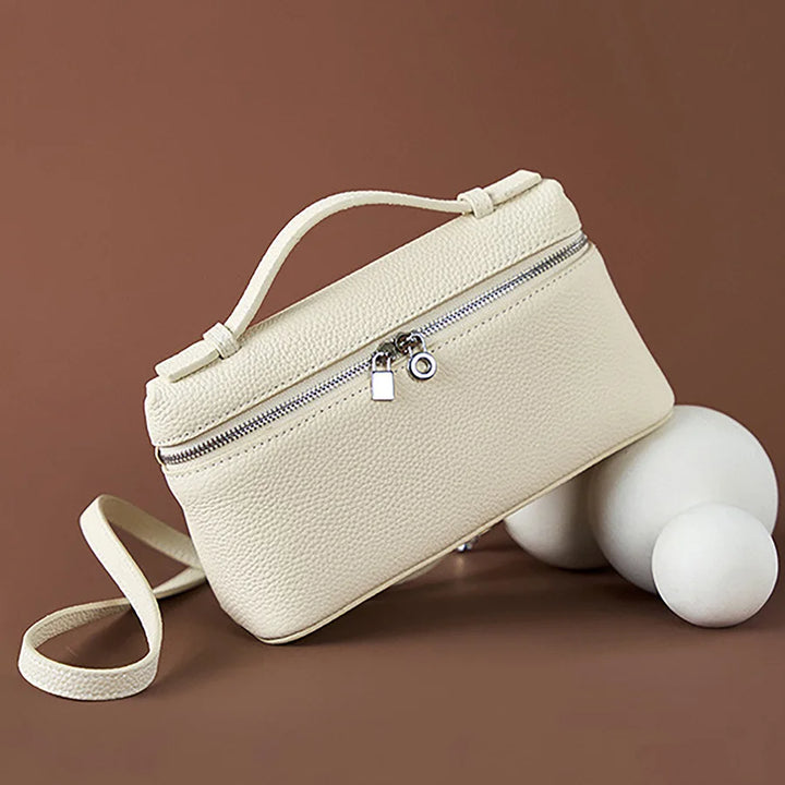 Sac bandoulière femme élégant en similicuir, pochette chic parfaite pour soirée ou accessoire de mode.