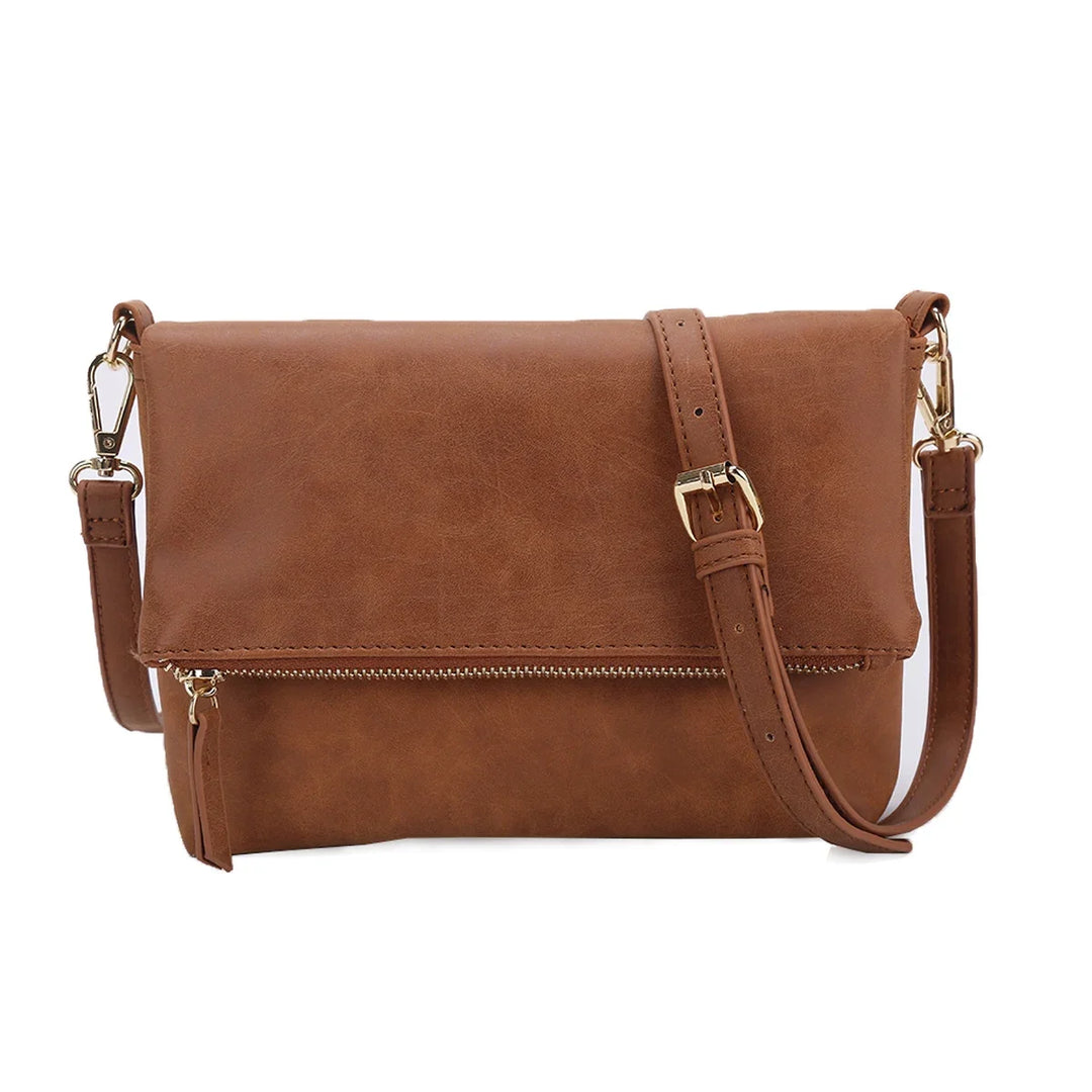 Sac bandoulière élégant en similicuir pour femme, design épuré et couleur intemporelle.