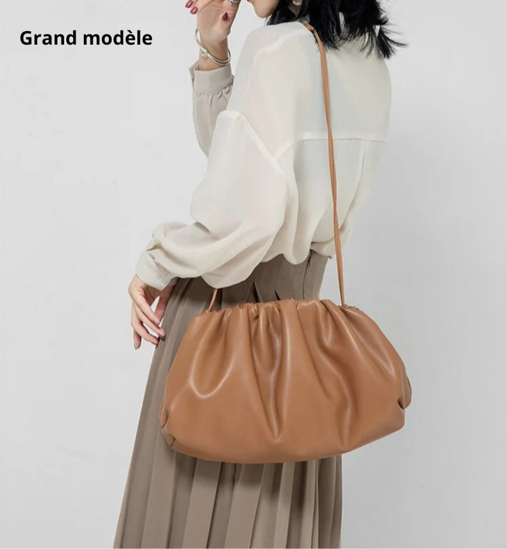 Sac pochette chic femme, design contemporain, parfait pour allier élégance et fonctionnalité.