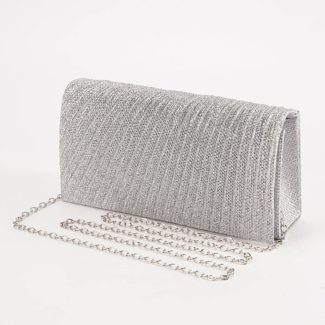 Clutch de soirée femme scintillant et élégant, parfait accessoire pour une tenue festive.