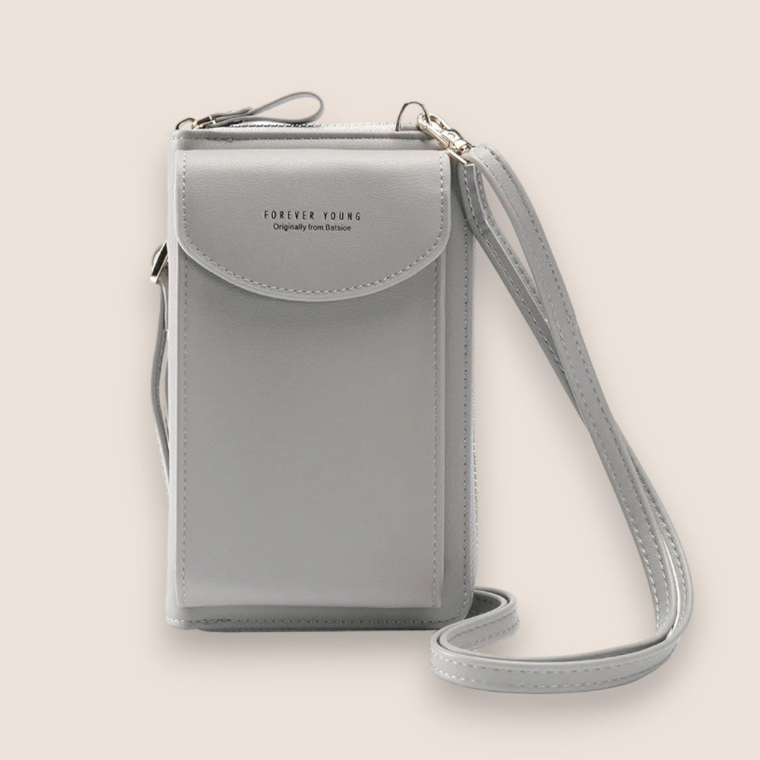 Pochette femme spacieuse, accessoire élégant et compagnon polyvalent pour organiser vos essentiels mode.
