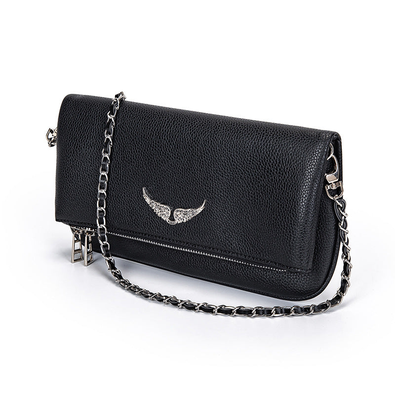 Pochette luxe femme, sac bandoulière chic. Design raffiné, petit format, idéale soirée ou quotidien.