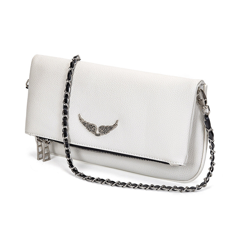 Pochette luxe femme, sac bandoulière chic. Design raffiné, petit format, idéale soirée ou quotidien.