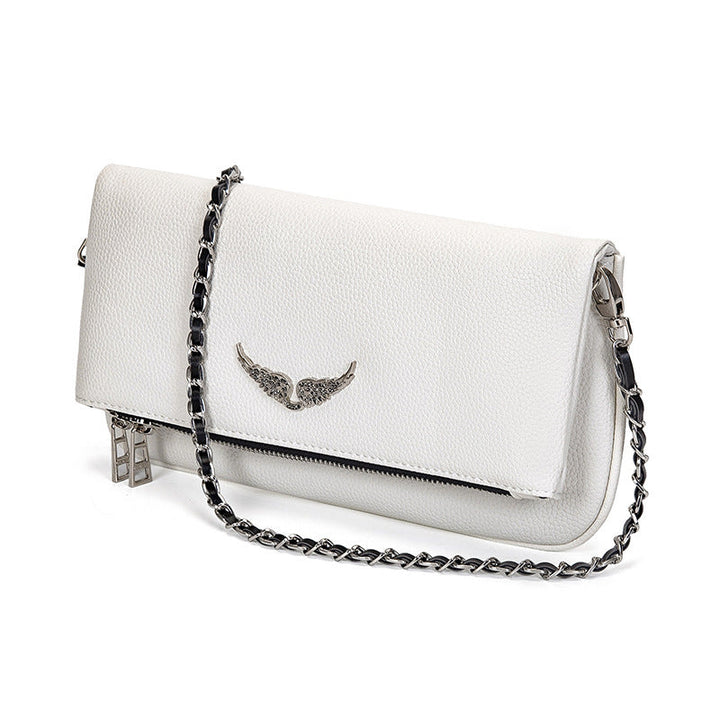 Pochette luxe femme, sac bandoulière chic. Design raffiné, petit format, idéale soirée ou quotidien.