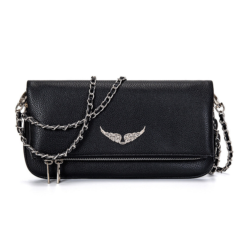 Pochette luxe femme, sac bandoulière chic. Design raffiné, petit format, idéale soirée ou quotidien.