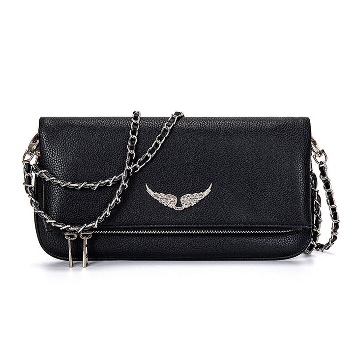 Pochette luxe femme, sac bandoulière chic. Design raffiné, petit format, idéale soirée ou quotidien.