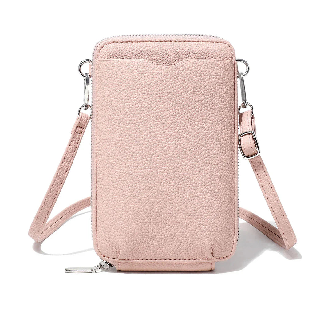 Accessoire quotidien femme, cette pochette portefeuille en similicuir allie chic et fonctionnalité.