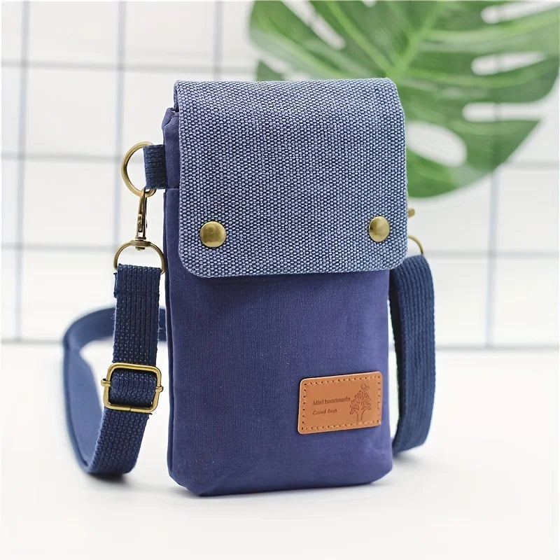 Pochette smartphone Linoé pour femme et enfant, en tissu, avec bandoulière réglable. Compacte et pratique.